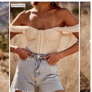 Cream corset top from 12th tribe